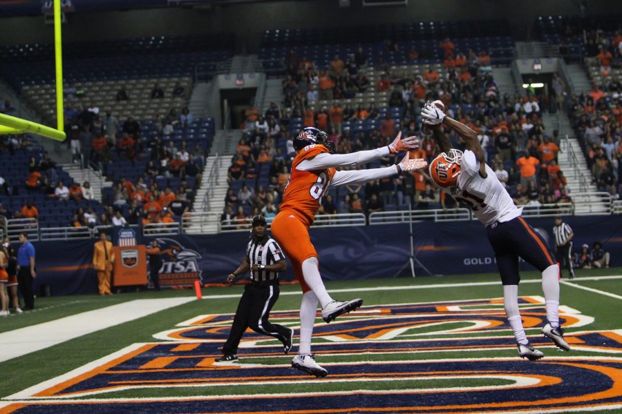 Defensive back Dashone Smith of UTEP intercepts a pass to wide reciever Josh Stewart in the second half of Saturday’s game between UTSA and UTEP at the Alamodome. UTSA lost in quintuple-overtime 52-49. David Guel, The Paisano