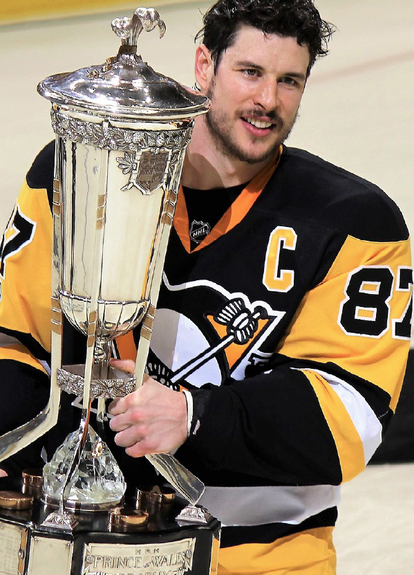 Sidney Crosby poses with trophy after winning
game 7 of ECF. Photo courtesy of Michael Miller