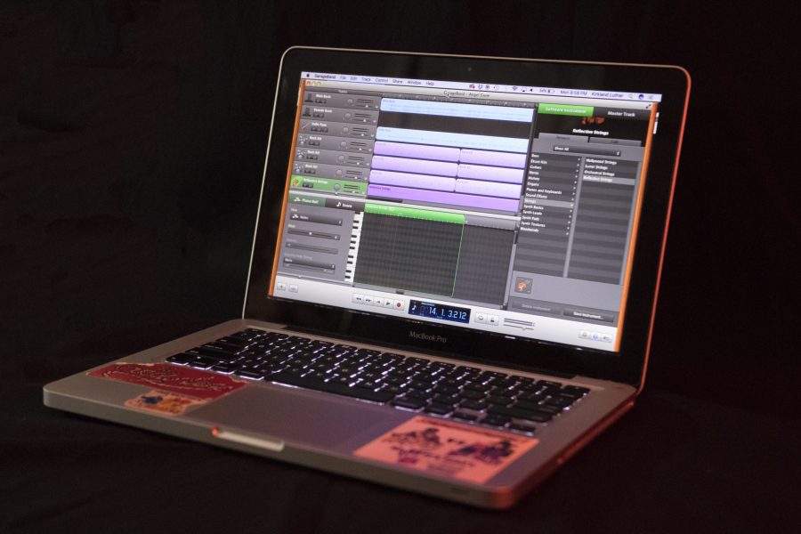 Open laptop showing music production software