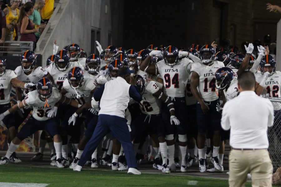 Frank Wilson hypes the team up in the tunnel before the game.

Ricky Galindo/The Paisano