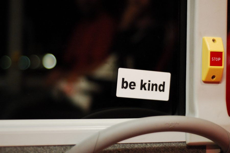 Be Kind sticker on window