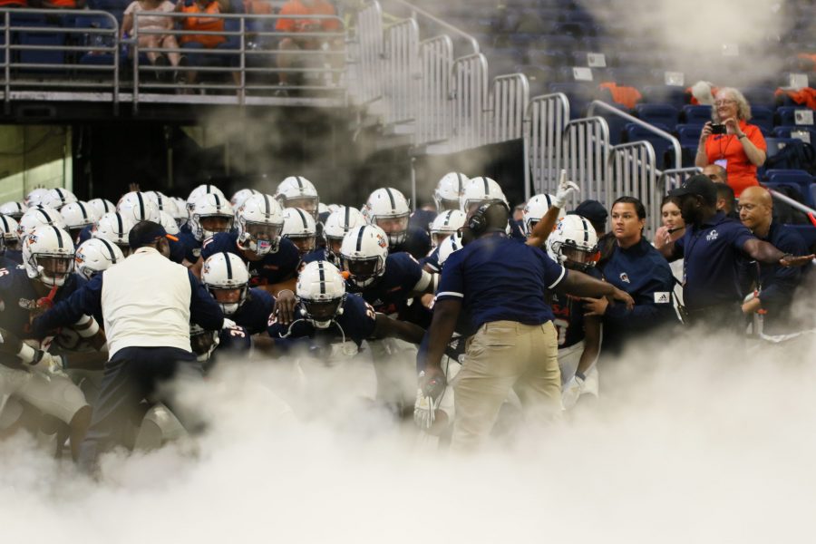 Frank Wilson and his team taking the field before a game. Photo by Lindsey Thomas