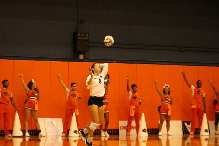 Courtney Walters serves an ace against the Charlotte 49ers.