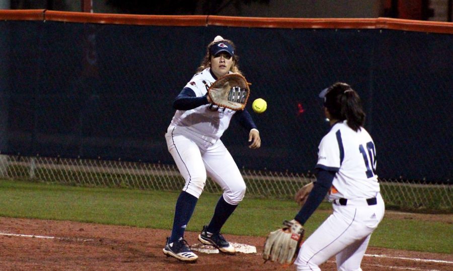 Victoria Villarreal catches a throw from Clarissa Hernandez. The ‘Runners went 3-2 in the Bobcat Classic.