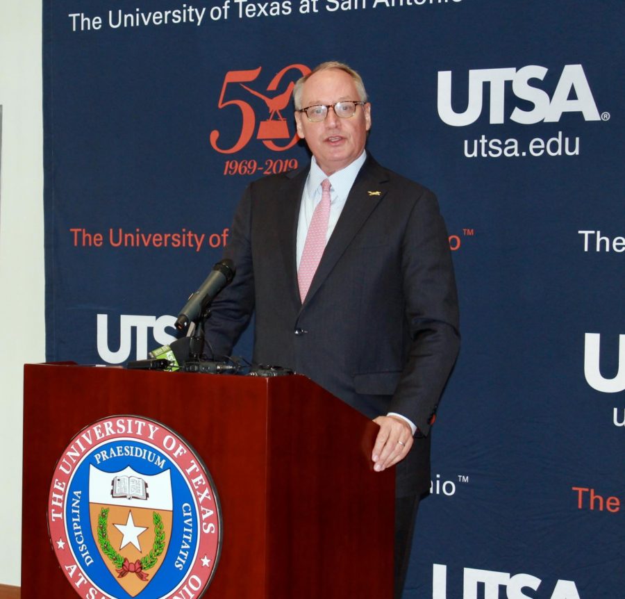 President Eighmy speaks at a podium. Eighmy announced on May 11 that UTSA campuses will reopen in the coming fall. 