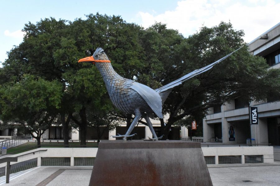 The rowdy statue in the Sombrilla is wearing a mask. UTSA announced that they were eliminating 243 staff and 69 faculty positions for fiscal year 2020 due to budget cuts caused by COVID-19