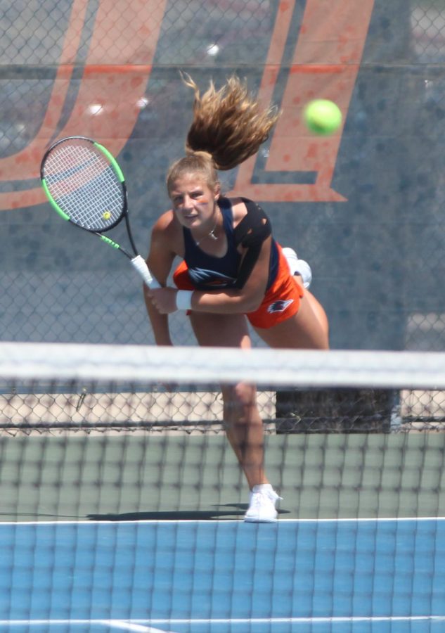 Aleksandra Zlatarova fires a serve over the net during a match earlier this season. Zlatarova is currently 3-2 in singles play this season and was named second team All-Conference USA in doubles last season and is 3-2 in doubles this season.