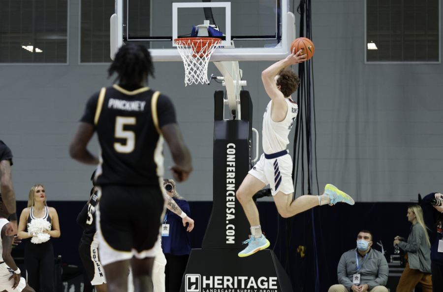 Lachlan+Bofinger+soars+through+the+air+to+throw+down+a+dunk+during+UTSAs+opening+round+game+against+the+Southern+Mississippi+Golden+Eagles+during+the+first+round+of+the+Conference+USA+Mens+Basketball+Championship.+Bofinger%2C+a+freshman+from+Sydney%2C+Australia%2C+started+five+of+UTSAs+six+regular+season+games+and+averaged+3.3+points+and+3.8+rebounds+per+game+this+year.+Photo+courtesy+of+Conference+USA