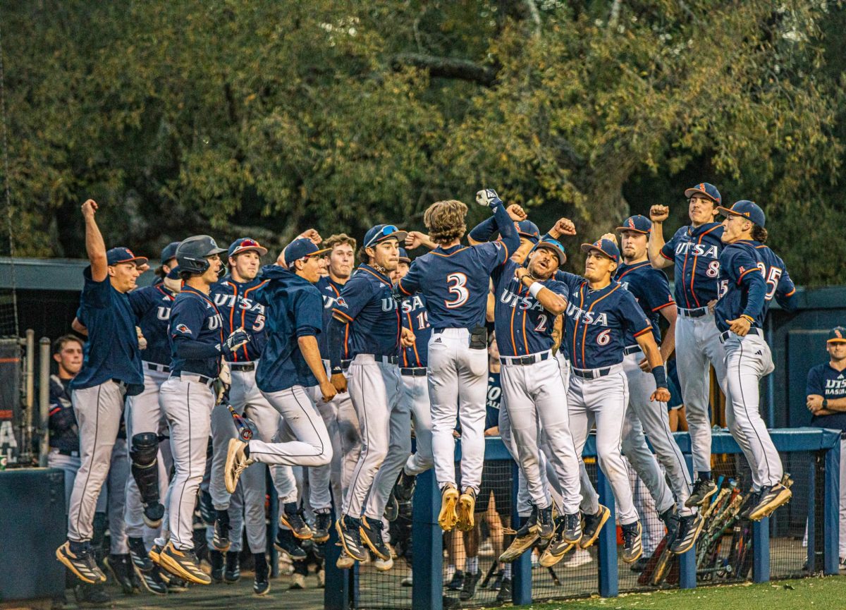 Mason Lytle celebrates with his team after launching a three-run home run.