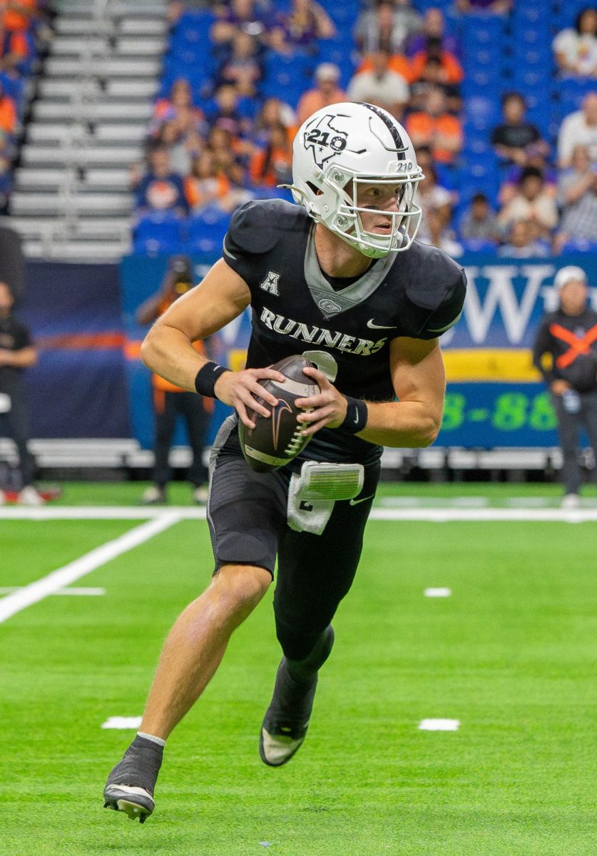 UTSA quarterback Owen McCown scrambles before throwing a touchdown in the Roadrunners' 58-24 win over East Carolina University Saturday, Nov. 22, 2025 at the Alamodome in San Antonio, Texas.
