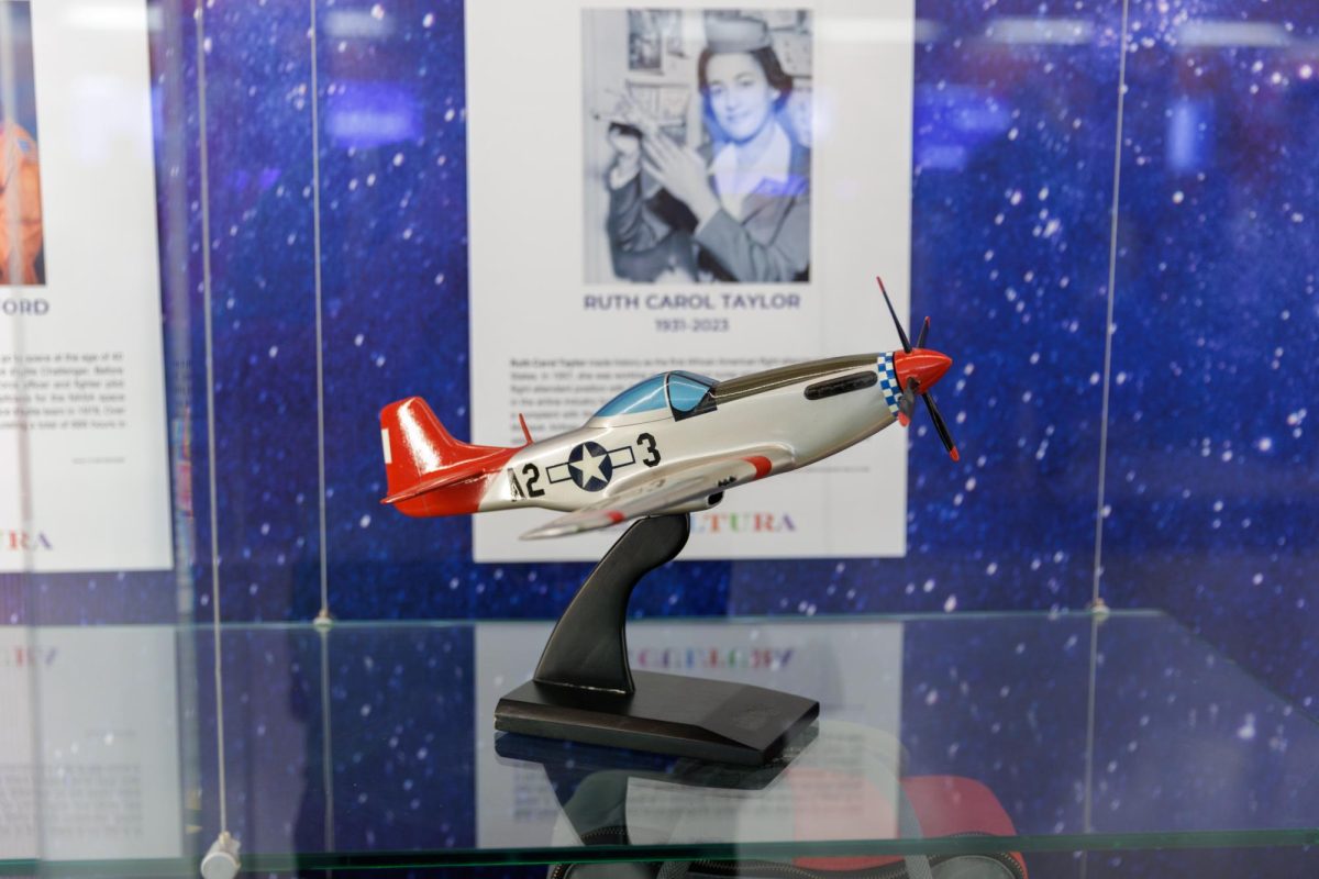 African American aviator exhibit prepares for takeoff at airport